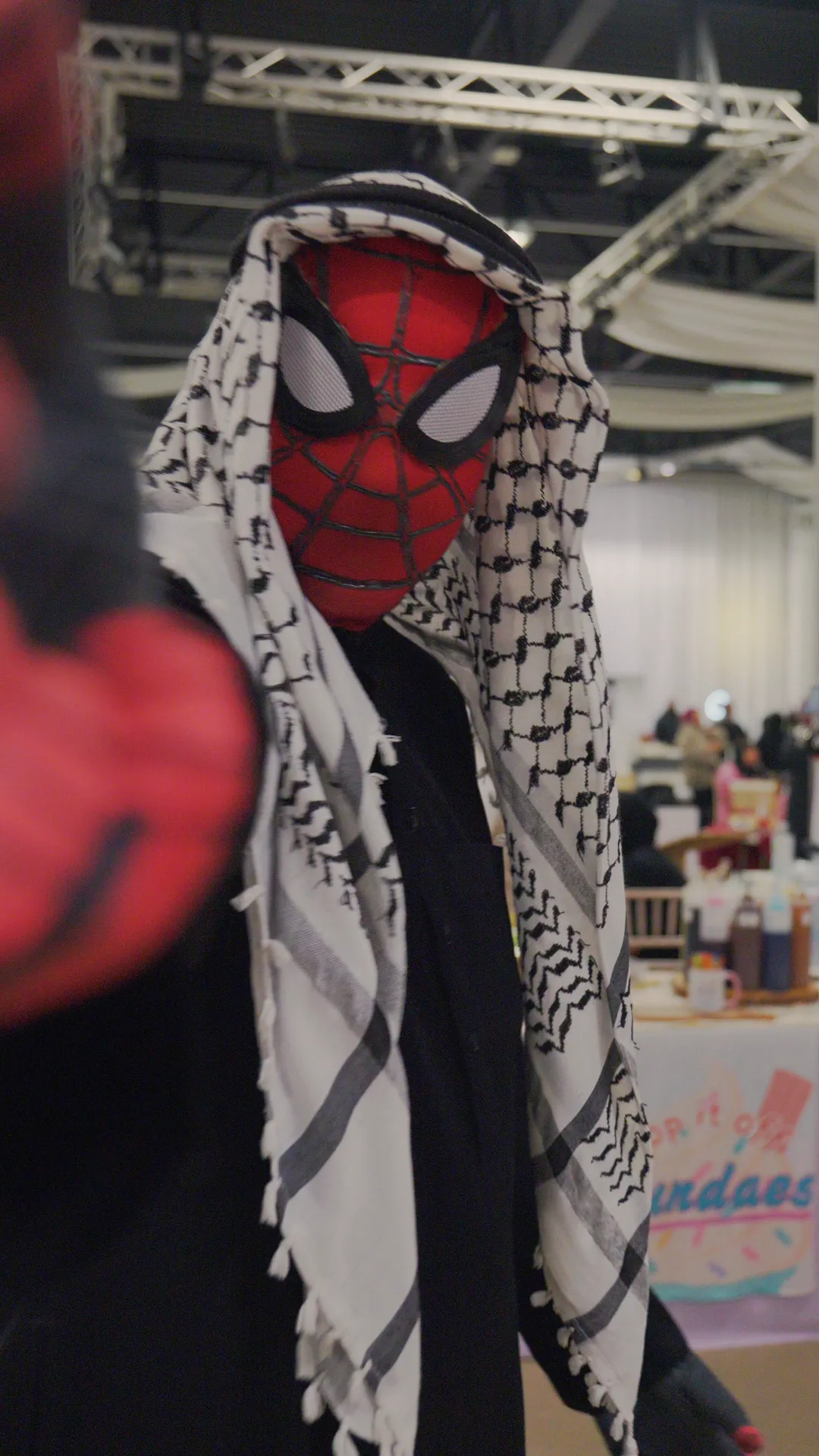 A Spider-Man cosplayer at a family fun day