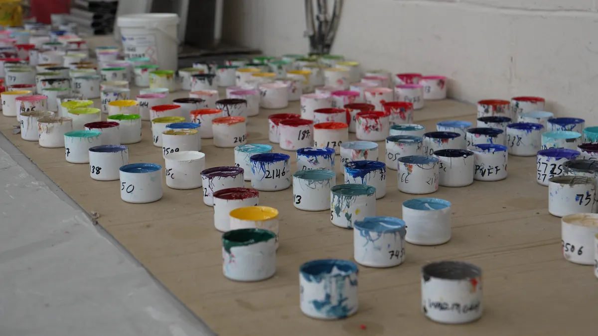 Rows of ink pots on the print floor