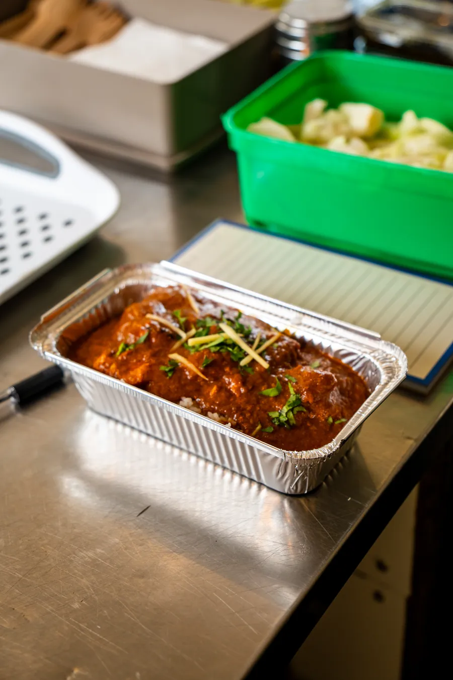 A tray of curry on the trailer counter